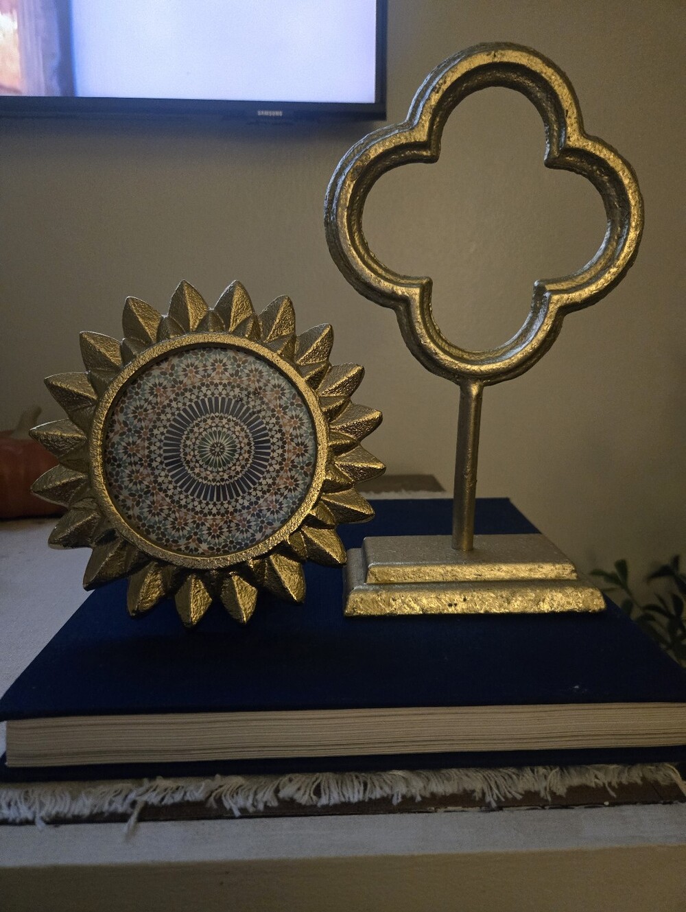 gold-finished cast iron quatrefoil design with a texture/ Gold Sunflower Frame